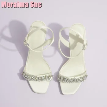 Пикантные Босоножки с открытым носком, украшенные кристаллами, на высоком каблуке-шпильке, Белые однотонные женские свадебные туфли с ремешком и пряжкой на щиколотке, для банкета, модные летние